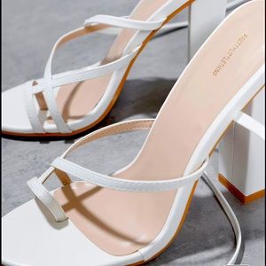 White toe loop heeled sandals